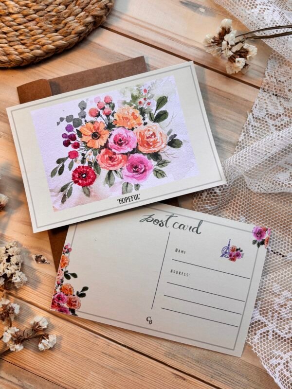 hopeful postcard showing front & back on the table
