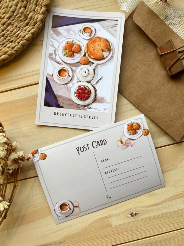 breakfast served postcard with back side of it along with brown envelope