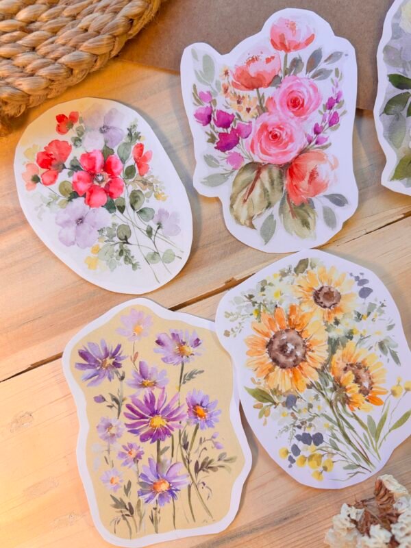 four floral stickers placed on the table