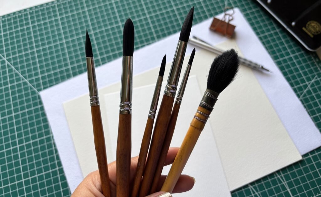 Round watercolour brushes in different sizes used for detail work and washes